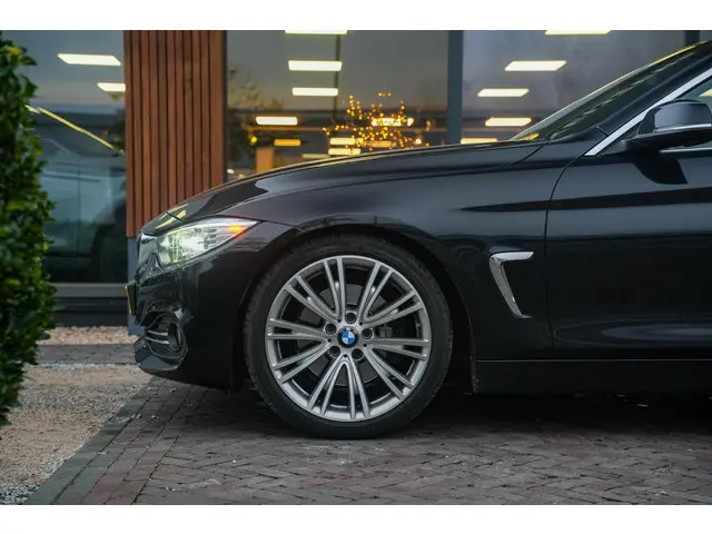 BMW 4 Serie Coupé 428i High Executive 2015 Benzine 12