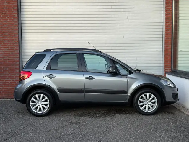 Suzuki SX4 1.6 Executive| NAVI | AIRCO | NEW APK | 2012 Benzine 7