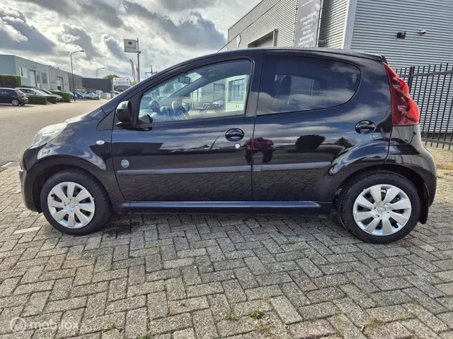 Peugeot 107 1.0 Envy 2013 Benzine 8