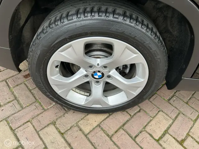 BMW X1 sDrive18i * AUTOMAAT * NAVIGATIE * AIRCO * 2013 Benzine 19