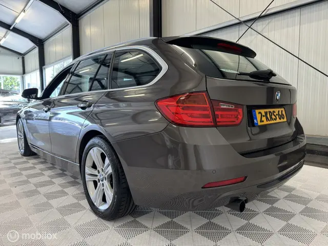 BMW 3 Serie Touring 316i Business 2013 Benzine 6