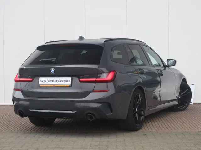 BMW 3 Serie Touring 330i High Executive 2021 Benzine 7