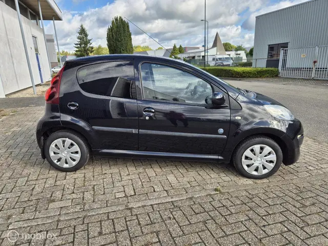 Peugeot 107 1.0 Envy 2013 Benzine 4