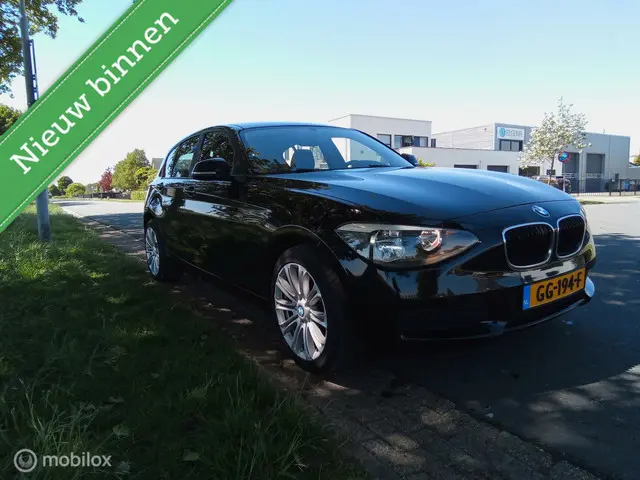 BMW 1 Serie 114i EDE Business 2013 Benzine
