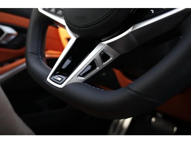 BMW M3 3-serie Touring xDrive Competition 2025 Benzine 38