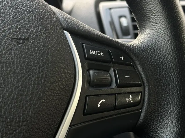 BMW 1 Serie 114i Business+ 2013 Benzine 24