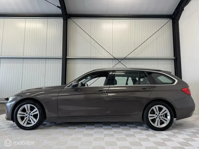 BMW 3 Serie Touring 316i Business 2013 Benzine 5