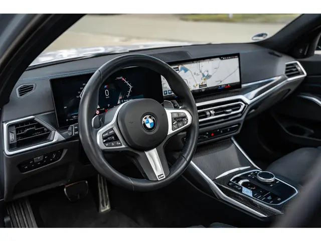 BMW 3 Serie Touring 320i High Executive 2023 Benzine 9