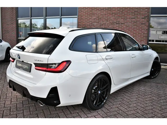 BMW 3 Serie Touring 330e M-Sport 2023 Hybride Benzine 84