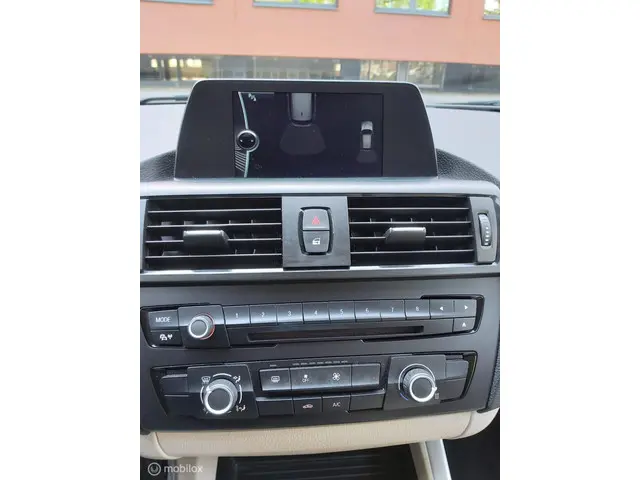 BMW 1 Serie 114i EDE Business Sport 2013 Benzine 63