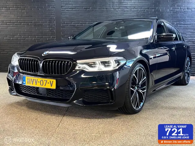 BMW 5 Serie M550i xDrive High Executive 2017 Benzine