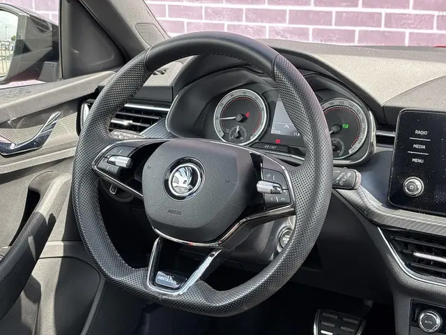 Škoda Kamiq 1.0 TSI Sport Business 2023 Benzine 13