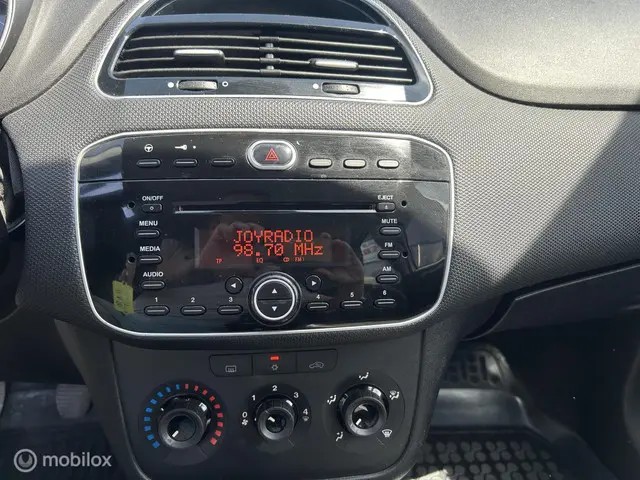 Fiat Punto Evo 1.2 "AIRCO+LMV+ZUINIG+WEINIG KM" 2012 Benzine 9
