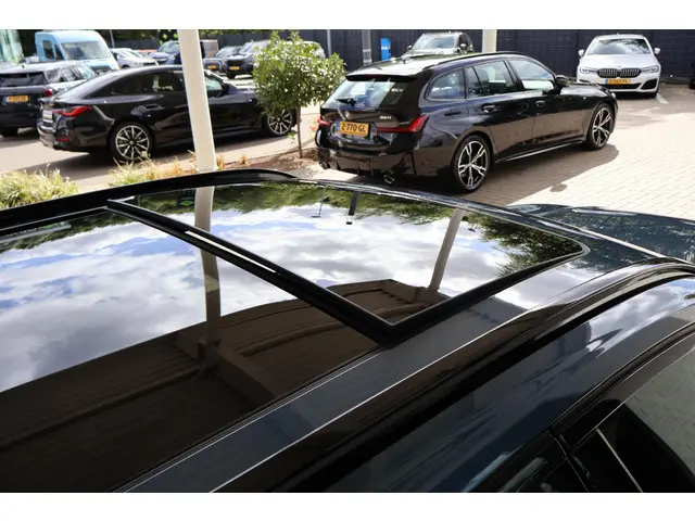 BMW 3 Serie Touring 330e xDrive 2025 Hybride Benzine 7