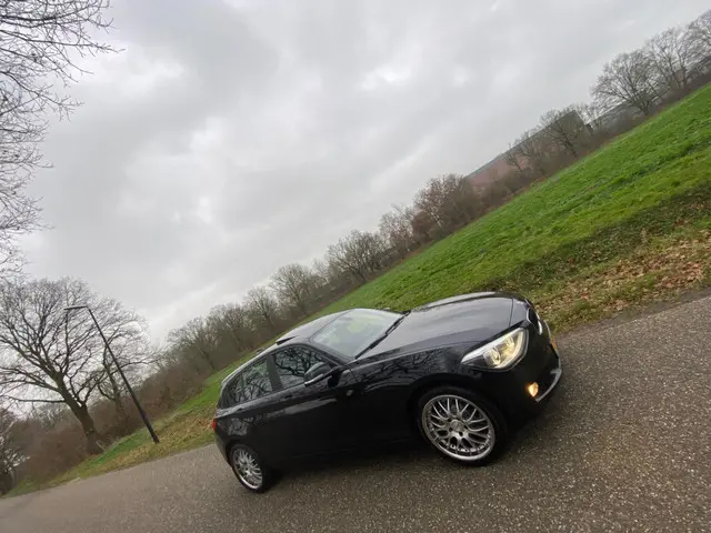 BMW 1 Serie 116i AUTOMAAT. LEDER 2013 Benzine 42