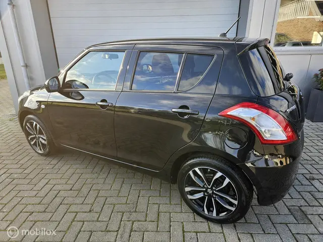 Suzuki Swift 1.2 X-tra zeer nette auto!! 2015 Benzine 5