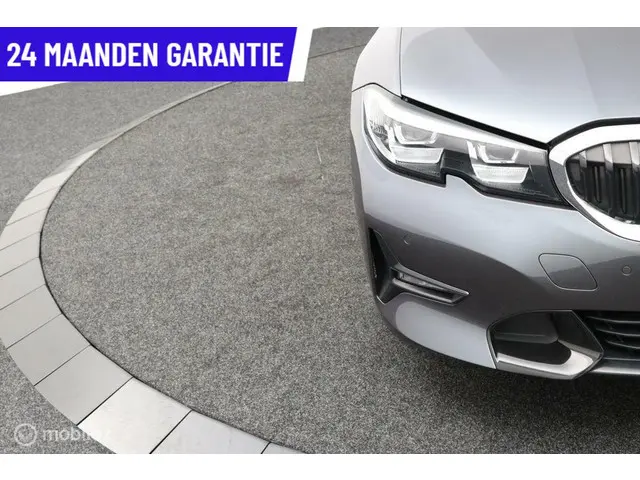 BMW 3 Serie Touring 320i High Executive 2020 Benzine 9