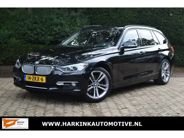 BMW 3 Serie Touring 328i High Executive 2013 Benzine 1
