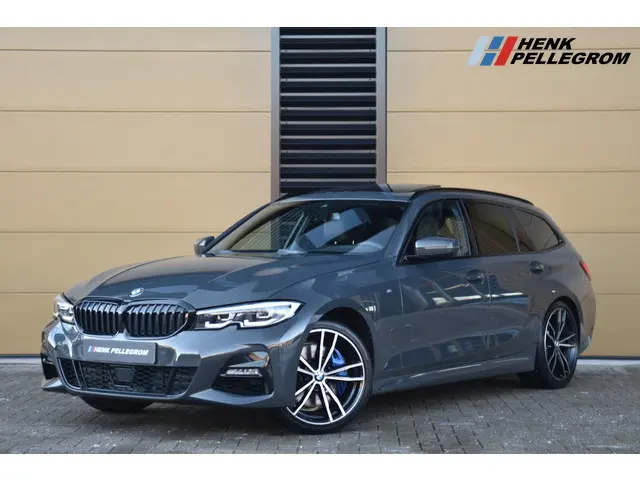 BMW 3 Serie Touring 320i Business Edition 2022 Benzine