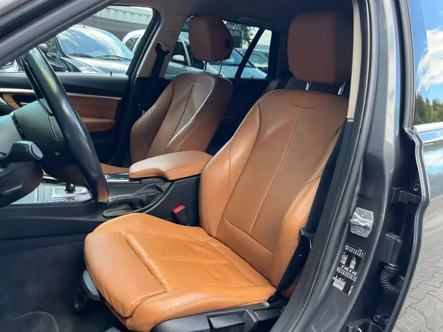 BMW 3 Serie Touring 318i Luxury Edition 2018 Benzine 7