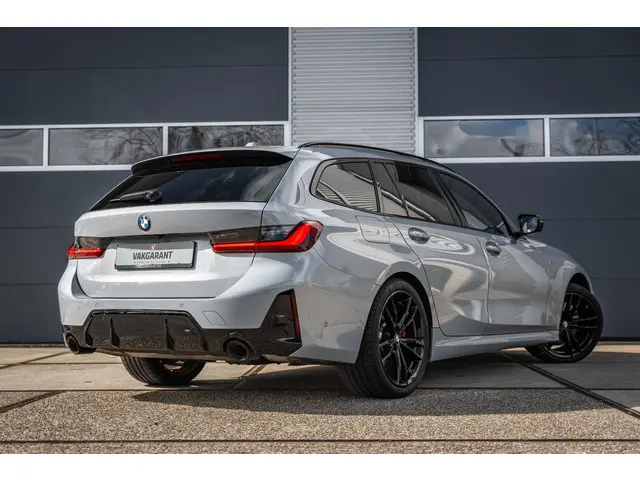 BMW 3 Serie Touring 320i High Executive 2023 Benzine 6
