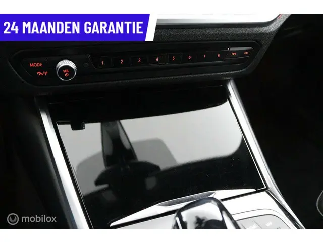 BMW 3 Serie Touring 320i High Executive 2020 Benzine 40