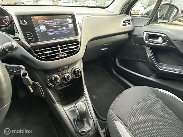 Peugeot 208 1.2 82PK STYLE | CRUISE | PDC | NAVI | 2015 Benzine 14