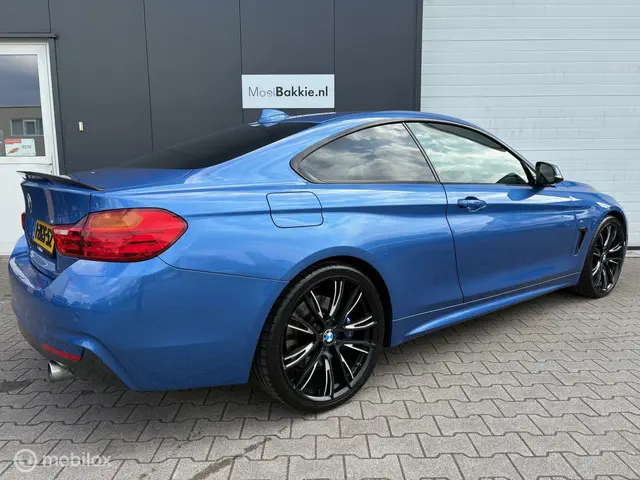 BMW 4 Serie Coupé 435i High Executive 2015 Benzine 4