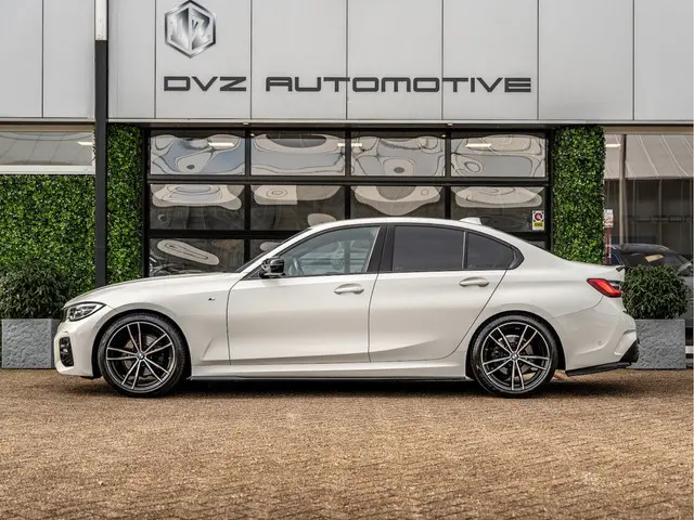 BMW 3 Serie 320i High Executive 2019 Benzine 7