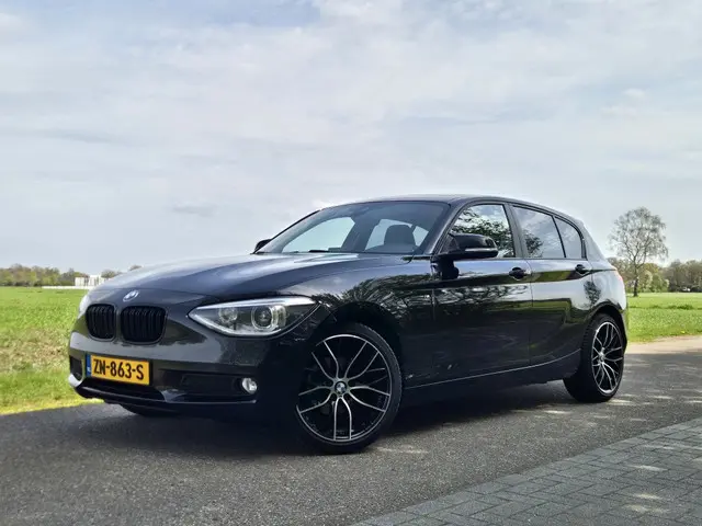 BMW 1 Serie 116i High Executive 2013 Benzine