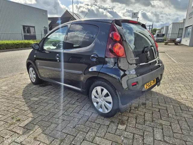Peugeot 107 1.0 Envy 2013 Benzine 7