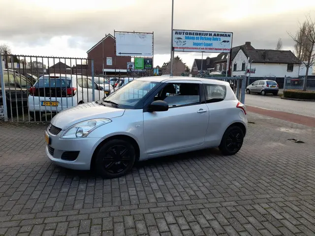 Suzuki Swift 1.2 Base 2013 Benzine 11
