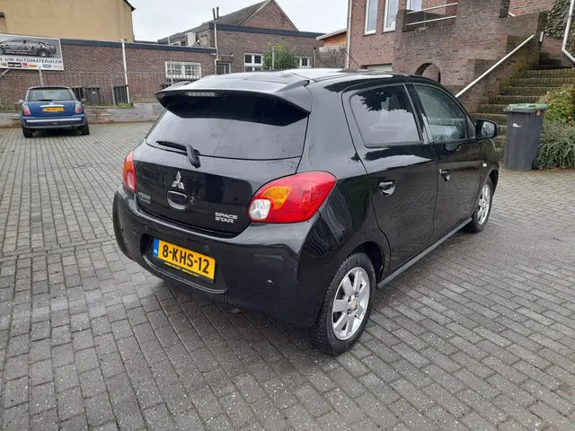 Mitsubishi Space Star 1.0 Intense 2013 Benzine 7