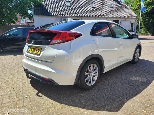 Honda Civic 1.4 Comfort cruise/clima/trekhaak 2014 Benzine 4