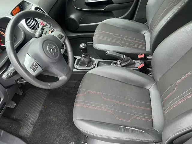 Opel Corsa 1.2-16V Rhythm Airco. PDC 2013 Benzine 12