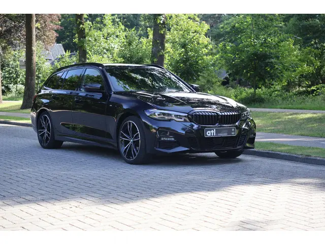 BMW 3 Serie Touring 320i Executive 2022 Benzine 7