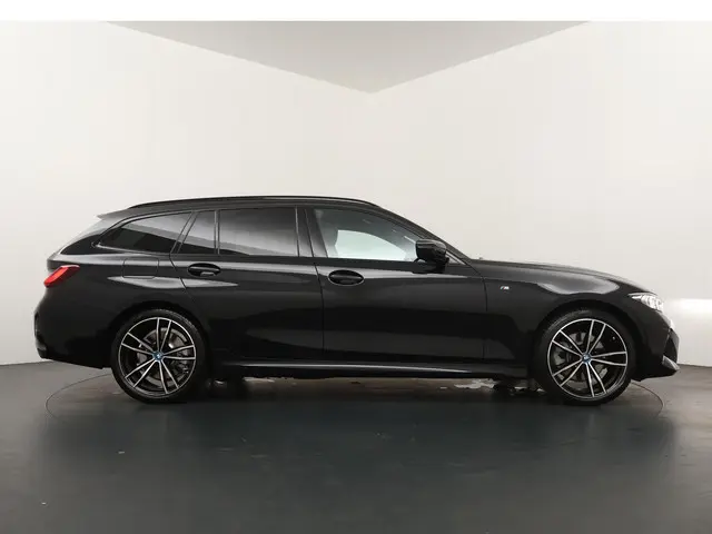 BMW 3 Serie Touring 320e 2024 Hybride Benzine 7