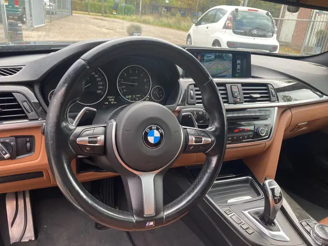 BMW 4 Serie Coupé 428i High Executive 2014 Benzine 8