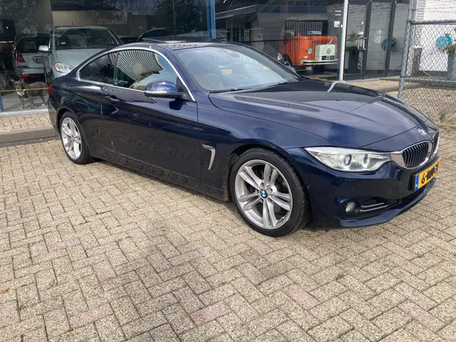 BMW 4 Serie Coupé 428i High Executive 2014 Benzine 2