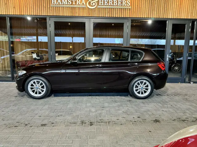 BMW 1 Serie 118i Bruin Metallic, automaat 2015 Benzine 7