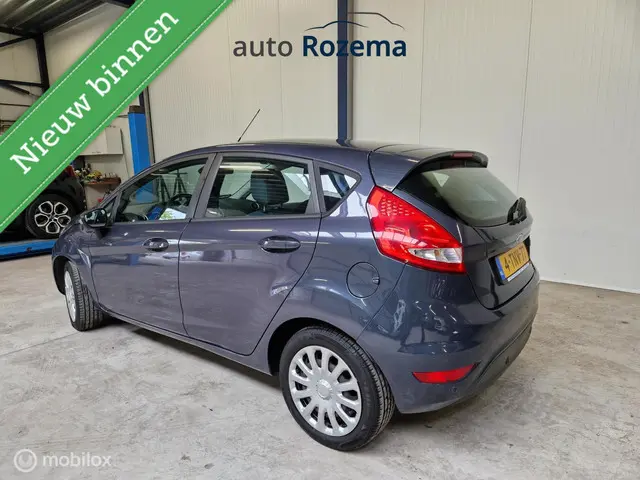 Ford Fiesta 1.25 Titanium Clima Cruis 2012 Benzine 2