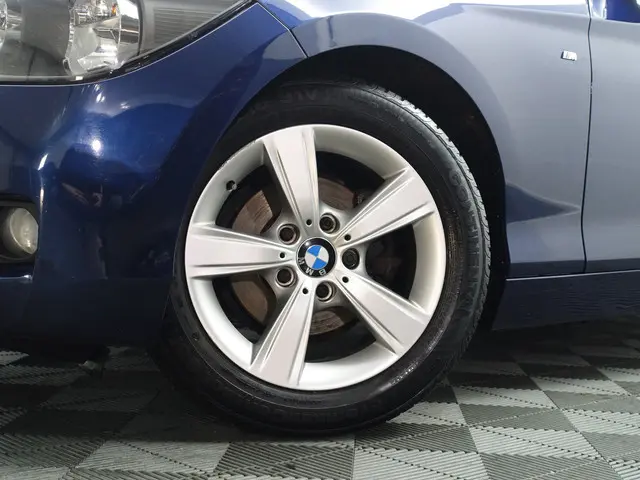 BMW 1 Serie 114i EDE High Executive 2013 Benzine 23