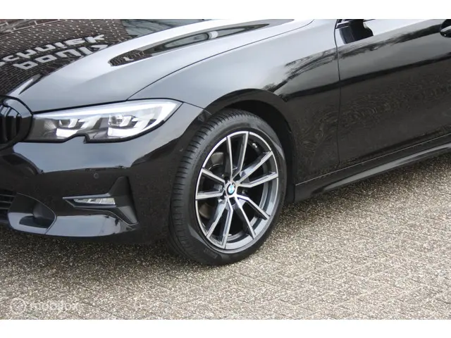 BMW 3 Serie Touring 318i 2.0 Sportstoelen 2021 Benzine 7