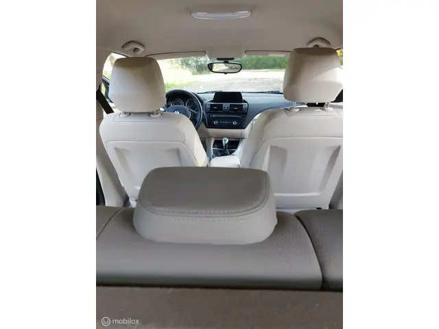 BMW 1 Serie 114i EDE Business Sport 2013 Benzine 43