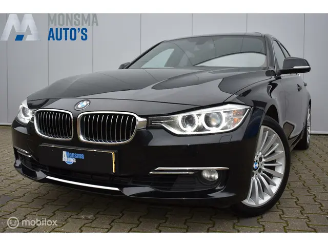 BMW 3 Serie 320i High Executive 2014 Benzine 2