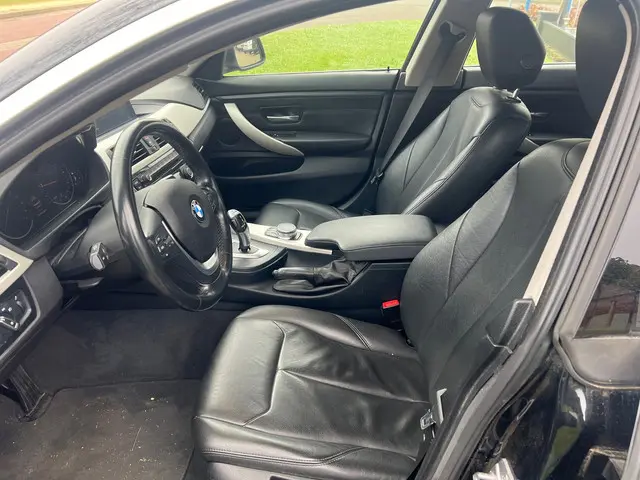 BMW 4 Serie Gran Coupé 418i High Executive 2017 Benzine 12