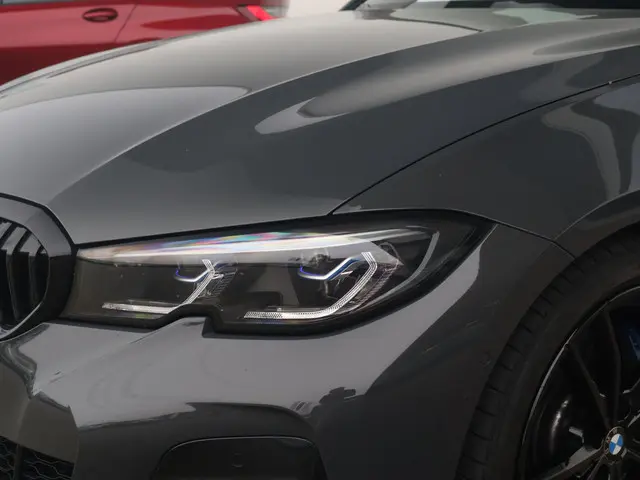 BMW 3 Serie Touring 330i High Executive 2021 Benzine 59