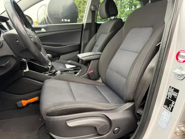 Hyundai Tucson 1.6 GDi Comfort 2015 Benzine 7