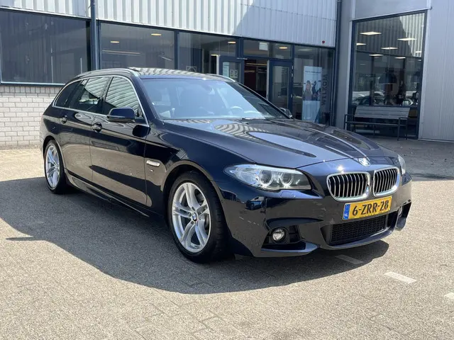 BMW 5 Serie Touring 520i High Executive 2015 Benzine 69