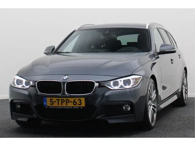 BMW 3 Serie Touring 335i High Executive 2014 Benzine 25